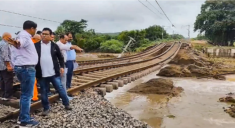 Washed away railway tracks following heavy rainfall in Secunderabad, Monday - PTI